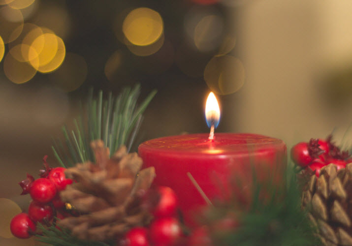 first christmas keepsakes with Christmas candle burning