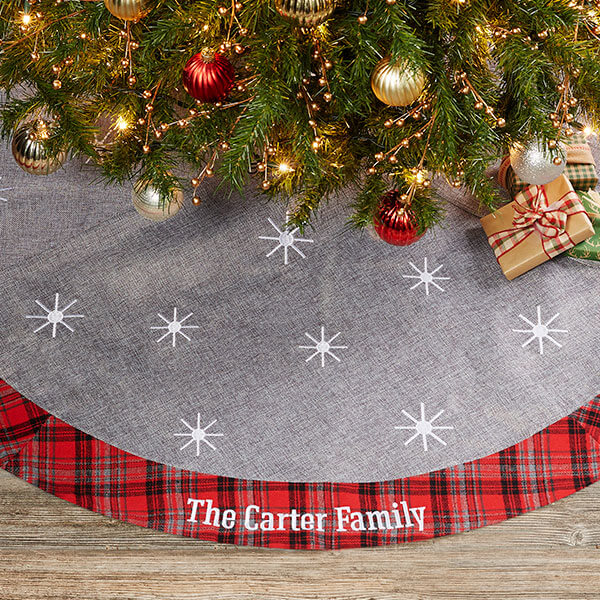Personalized plaid decor with a personalized tree skirt.