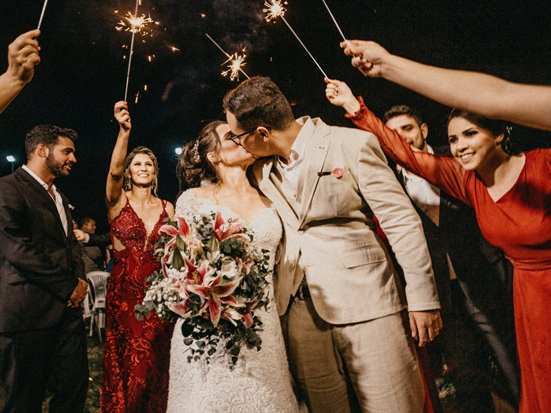 2023 wedding trends with guests holding sparklers