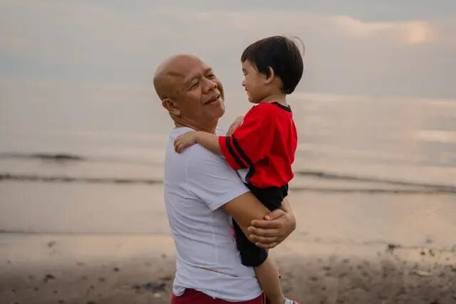 when is grandparents day grandfather holding grandson