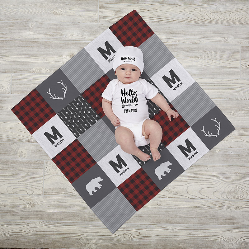 what to write in a newborn card baby lying on blanket